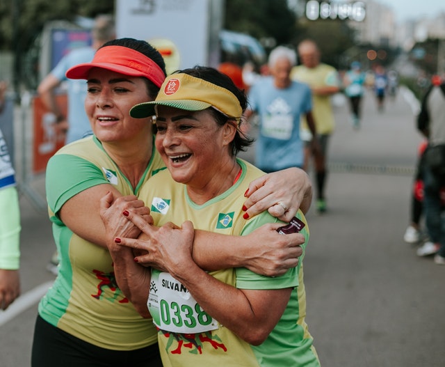 two women running